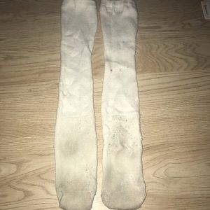 Worn white soccer socks